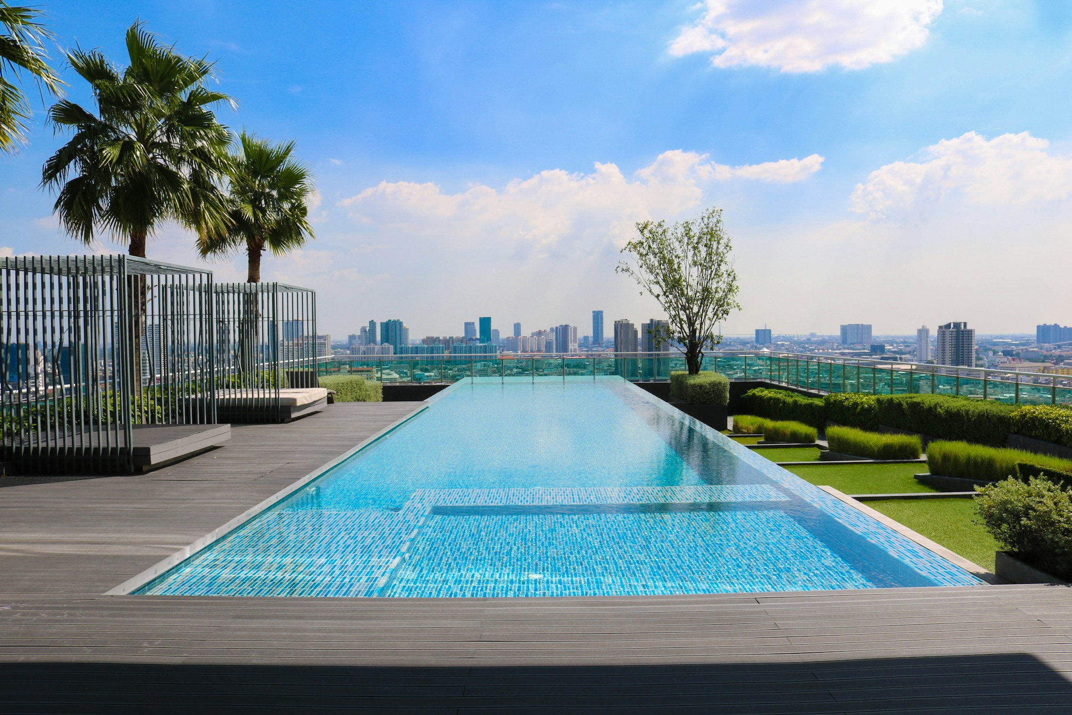 Luxury backyard pool with clear water and modern outdoor living area