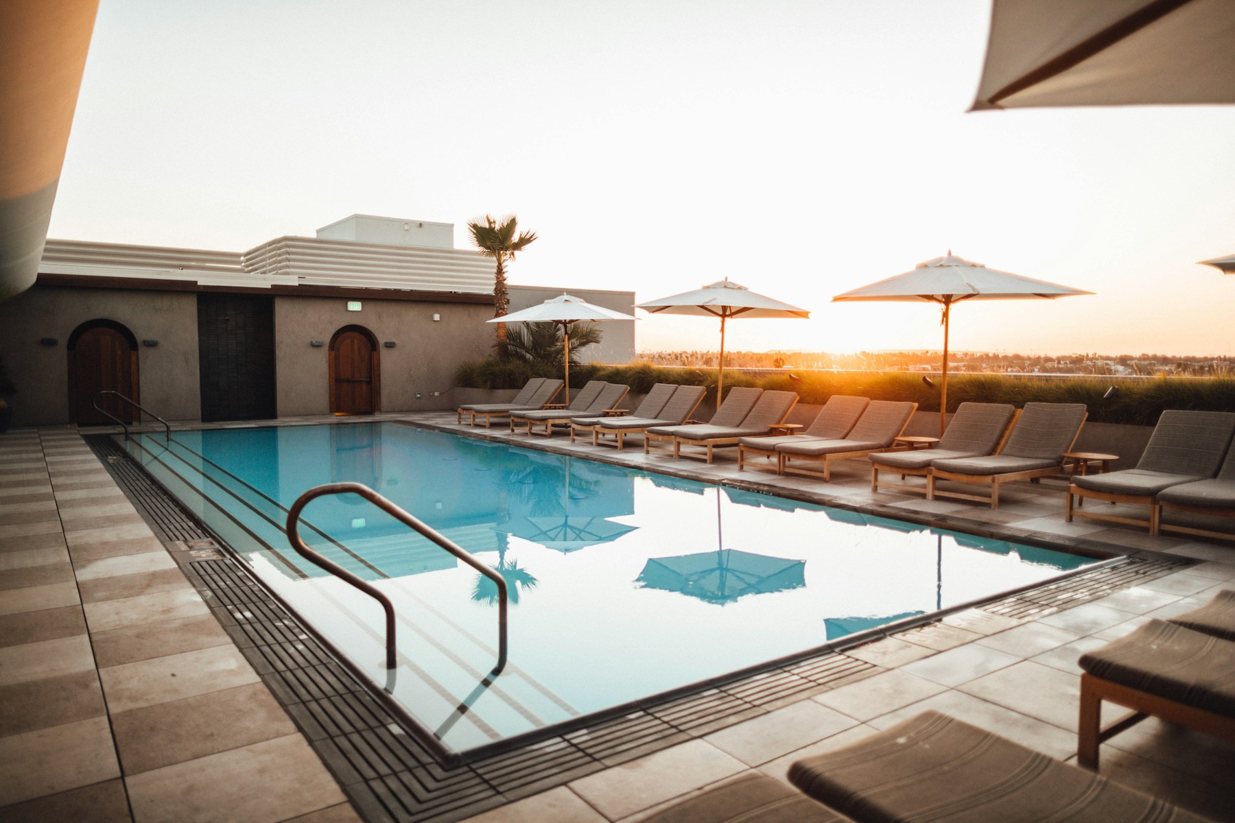 Modern swimming pool detail with water and tile